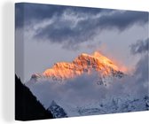 Canvas Schilderij Zonsondergang over de Zwitserse Alpen bij de Eiger - 120x80 cm - Wanddecoratie