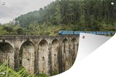 Muurdecoratie Blauwe trein rijdt over de Negen bogen brug in Sri Lanka - 180x120 cm - Tuinposter - Tuindoek - Buitenposter