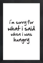 JUNIQE - Poster in houten lijst hungry -20x30 /Zwart