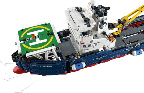 Blauwe LEGO-onderzoeksboot met helikopterplatform, zijkant bakboord.