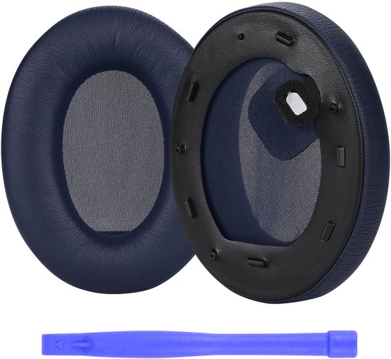 Deux coussinets d'oreille de remplacement bleu foncé pour casque, dont un tourné vers l'intérieur, avec un outil bleu.
