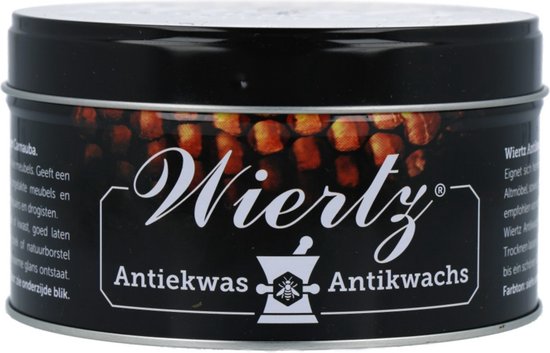 Zwarte blik met "Wiertz Antiekwas", tekst en afbeelding van honingraten.