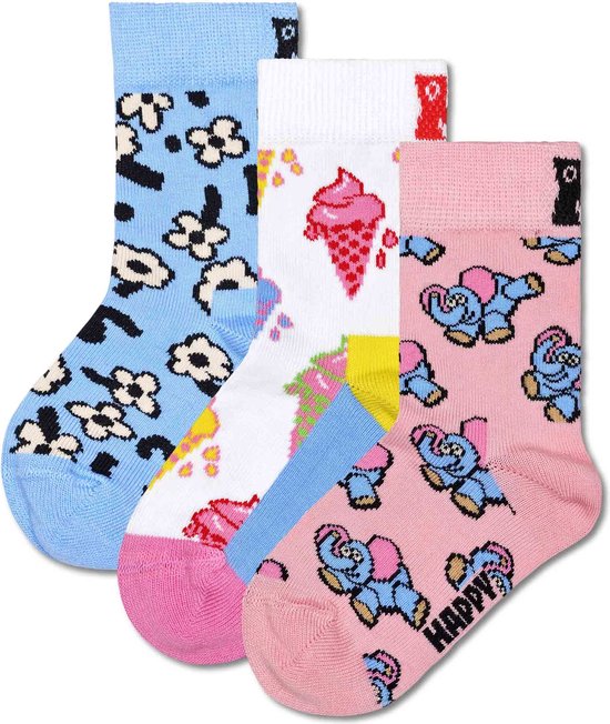Drie paar Happy Socks voor kinderen: roze met blauwe olifanten, wit met rode ijshoorntjes en blauw met witte bloemen.