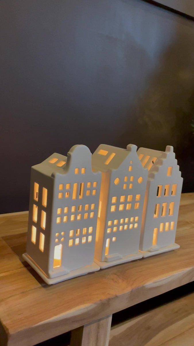 Donker blauw keramiek theelicht huis kerk met klok