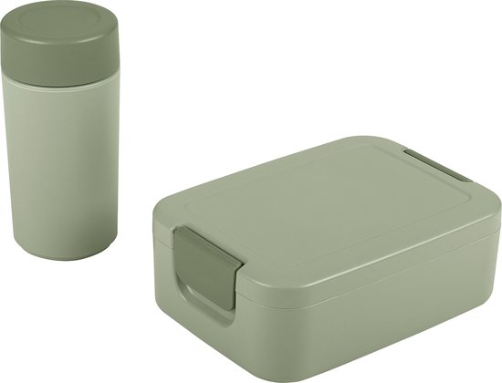 Boîte à lunch verte et tasse verte sur fond blanc.