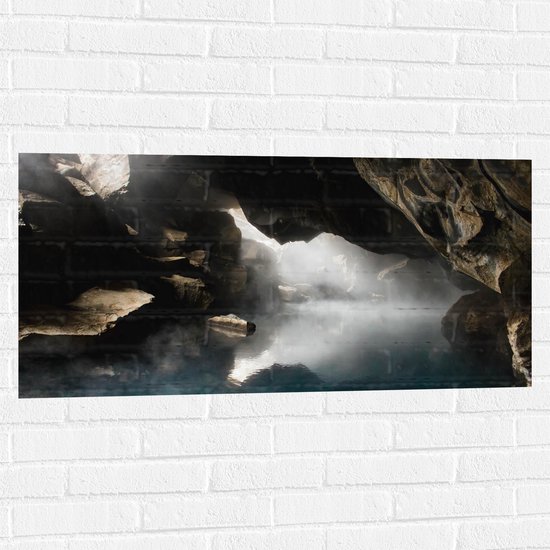 WallClassics - Muursticker - Mist over Water in een Grot - 100x50 cm Foto op Muursticker