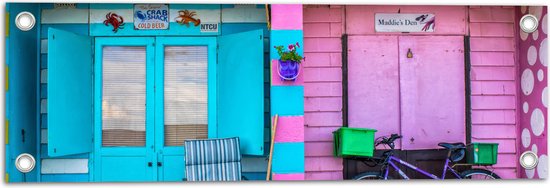 WallClassics - Tuinposter – Blauw en Roze Strandhuisjes - 60x20 cm Foto op Tuinposter  (wanddecoratie voor buiten en binnen)