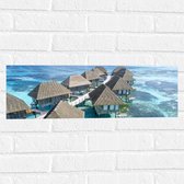 WallClassics - Muursticker - Bungalows in de Zee op een IJland - 60x20 cm Foto op Muursticker