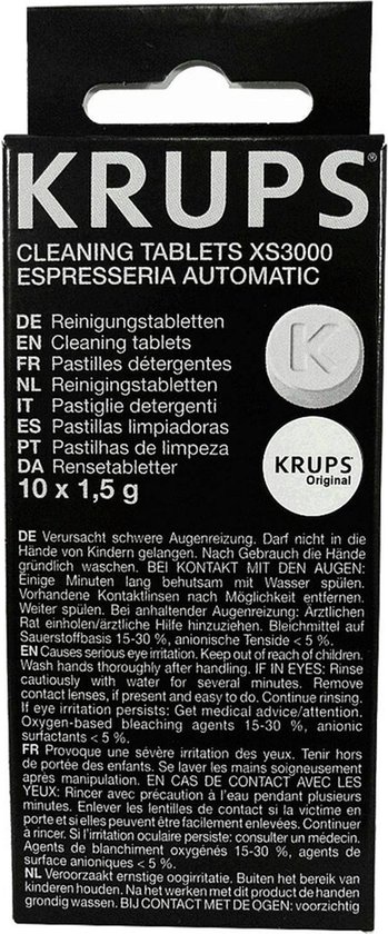 Verpakking met Krups reinigingstabletten, meertalige instructies.