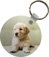 Sleutelhanger - Golden Retriever puppy liggend op de bank - Plastic - Rond - Uitdeelcadeautjes