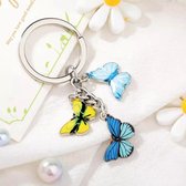 Sleutelhanger - Sleutelhanger met Drie verschillende Vlinder - Blauw, Geel, Blauw - Schattige Sleutelhanger met vlinders van Roestvrij Staal