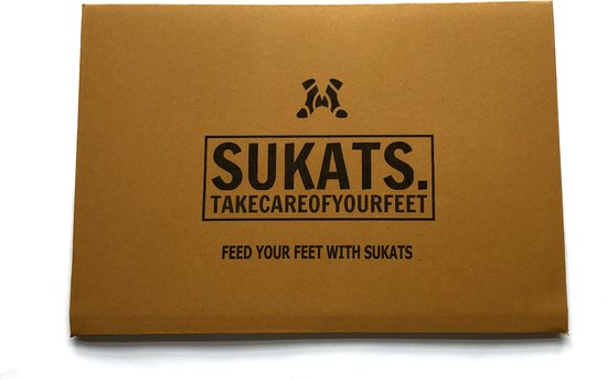 Bruine kartonnen verpakking met het Sukats logo en de tekst 'TAKECAREOFYOURFEET' en 'FEED YOUR FEET WITH SUKATS'.