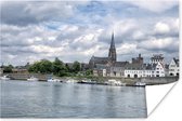 Uitzicht op Maastricht met lichte bewolking Poster 180x120 cm - Foto print op Poster (wanddecoratie woonkamer / slaapkamer) / Europese steden Poster XXL / Groot formaat!