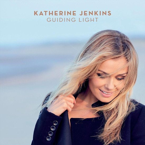 Katherine Jenkins, Guiding Light. Portret van Katherine Jenkins met blonde haren, die een zwarte jas draagt.