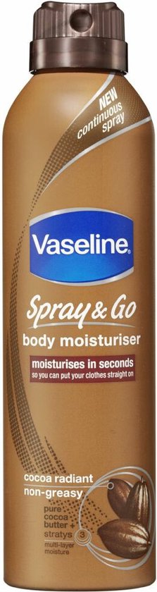 Bruine spuitbus Vaseline Spray & Go body moisturiser cocoa radiant, non-greasy, met afbeelding van cacaobonen.