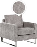 Fauteuil in lichtgrijs corduroy met verticale ribbels en chroomkleurige pootjes. Inzet toont detail van de stof.