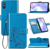 Voor Xiaomi Redmi 9A Vierbladige sluiting Reliëfgesp Horizontale flip TPU + PU lederen tas met lanyard & kaartsleuf & portemonnee & houder (blauw)