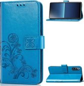 Voor Sony Xperia L4 vierbladige gesp reliëf gesp mobiele telefoon bescherming lederen tas met lanyard & kaartsleuf & portemonnee & beugel functie (blauw)