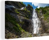 Canvas Schilderij Wilde waterval in het berglandschap van het Nationaal park Hohe Tauern - 120x80 cm - Wanddecoratie