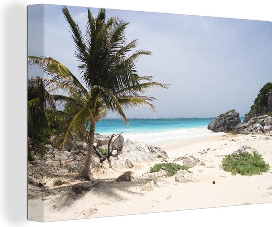 Canvas schilderij 180x120 cm - Wanddecoratie Een wit zandstrand met palmbomen bij het Nationaal park Tulum in Mexico - Muurdecoratie woonkamer - Slaapkamer decoratie - Kamer accessoires - Schilderijen