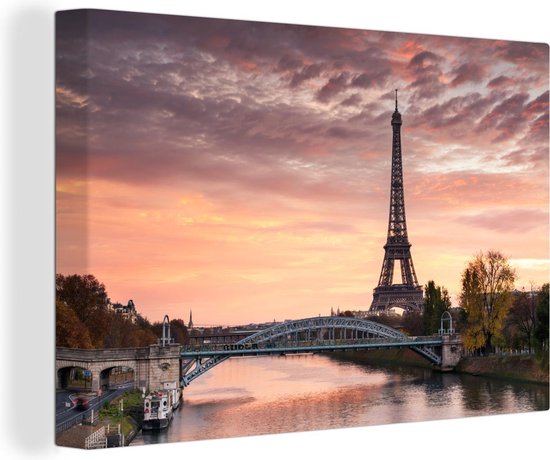 Canvas Schilderij Een mooie oranje lucht boven de Eiffeltoren in Parijs - 30x20 cm - Wanddecoratie