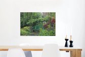 Canvas Schilderij Groene brug met klein meer in de Franse tuin van Monet in Giverny - 90x60 cm - Wanddecoratie