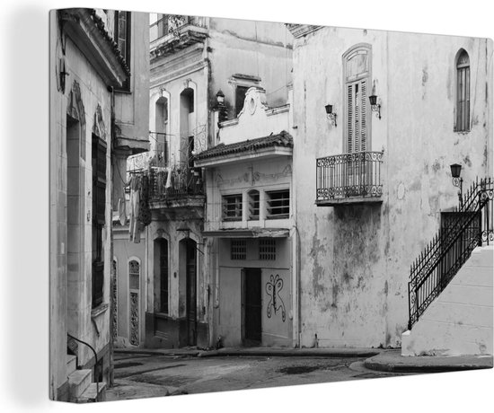 Canvas schilderij 140x90 cm - Wanddecoratie Straat in Cuba - zwart-wit - Muurdecoratie woonkamer - Slaapkamer decoratie - Kamer accessoires - Schilderijen