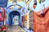 JJ-Art (Glas) | Marokko, Marrakesh, klein straatje met bogen, winkels, kleden, kleding en tassen | Foto-schilderij-glasschilderij-acrylglas-acrylaat-wanddecoratie | KIES JE MAAT