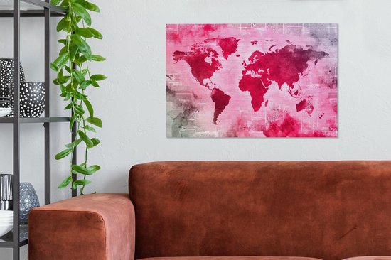 Wereldkaart avec peinture rose vif sur fond avec journal 90x60 cm