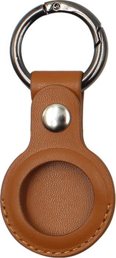 Bruine leren sleutelhanger met een metalen ring en een ronde uitsparing voor een Apple AirTag.