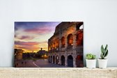Canvas Schilderij Het Colosseum in Rome bij een zonsondergang - 30x20 cm - Wanddecoratie