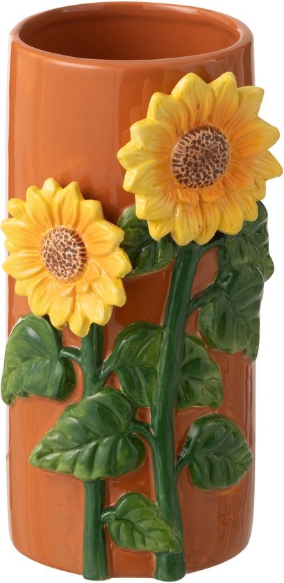 Vase orange avec deux tournesols et feuilles vertes