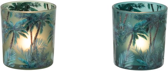 Set van twee glazen waxinelichthouders met palmbomenprint, een met een brandende kaars.
