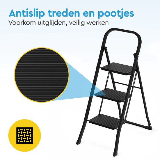 Detail van de antislip treden en pootjes van een zwarte metalen huishoudtrap.