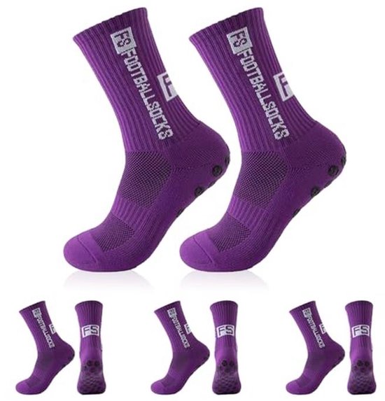 Chaussettes de football violettes avec inscription 'FS FOOTBALL SOCKS' et coussinets antidérapants. Plusieurs paires de chaussettes identiques présentées.