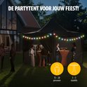 Antracietkleurige partytent met decoratieve verlichting, in de avond. Tekst: 'DE PARTYTTENT VOOR JOUW FEEST!'.
