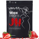 Zwarte verpakking JHUST Wax Beans met beeltenis van een vrouw, omringd door aardbeien.