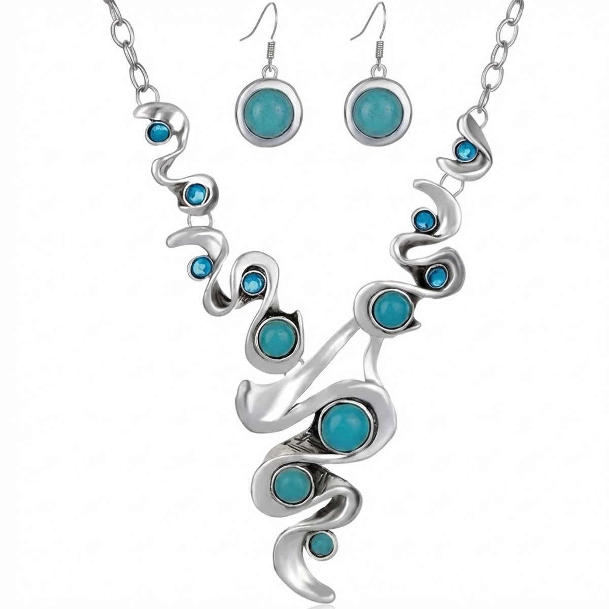 Zilverkleurige ketting en oorbellen met blauwe stenen en golvend design – ketting voor dames – statement ketting met fantasiehanger