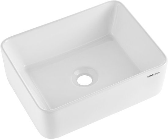 Un lavabo rectangulaire en céramique blanc avec des coins arrondis et un drain central.