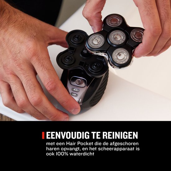Zwarte Remington hoofdscheerapparaat met 5 scheerkoppen in de hand; 'Eenvoudig te reinigen'.