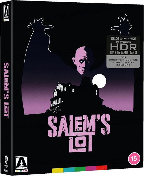 De achterkant van de verpakking toont een silhouet van een huis met een skeletachtige figuur, met de titel 'Salem's Lot' in paarse letters.