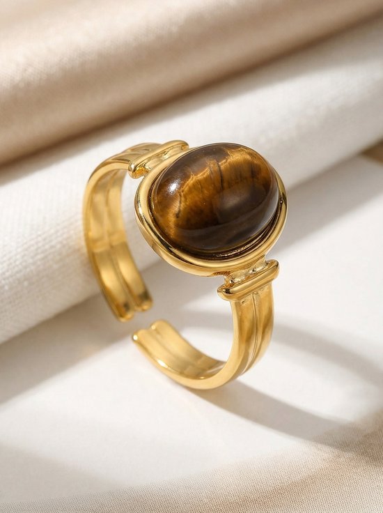 Gouden ring met ovaal, bruin tijgeroog-edelsteen. Verstelbaar design.