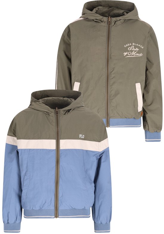 Veste réversible. Un côté est vert avec des rayures blanches. L'autre côté est vert, blanc et bleu clair.