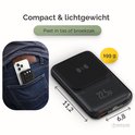 Zwarte magnetische powerbank met 22.5W, 199g, past in broekzak.