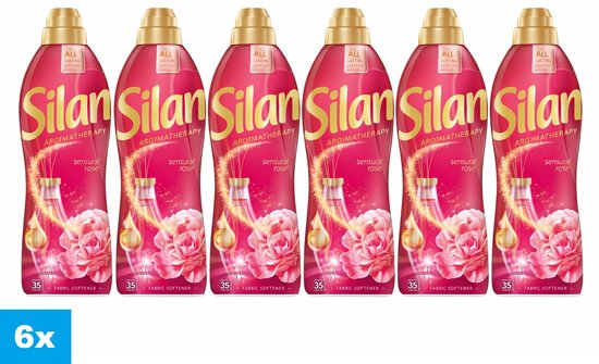 Six bouteilles d'adoucissant Silan Aromatherapy Sensual Rose, chacune avec un bouchon doré, une étiquette rose et des images de roses et de gouttes d'huile.