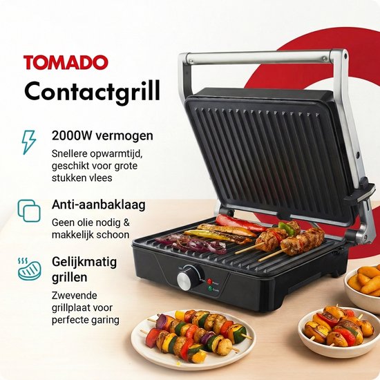 Zwarte contactgrill met gegolfde platen, waarop satés, groenten en zalm gegrild worden.