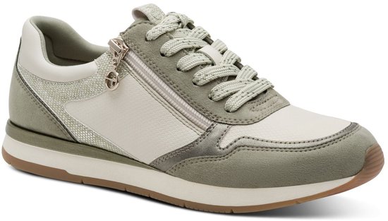 Groene en witte Tamaris sneaker met veters, ritssluiting en gouden ritsdetail.