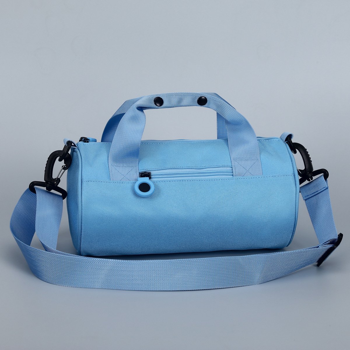 Grote dames sporttas (42x23 cm) in zonnig blauw, waterdichte reistas met vak voor natte kleding en verstelbare schouderband. Een kleine weekendtas, geschikt voor sport, de sportschool en weekendtrips.