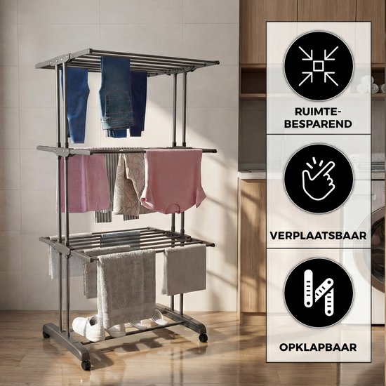 Donkergrijs kledingrek met 3 lagen, met jeans, shirts en handdoeken, plus schoenen onderaan. Iconen "RUIMTEBESPAREND", "VERPLAATSBAAR", "OPKLAPBAAR".