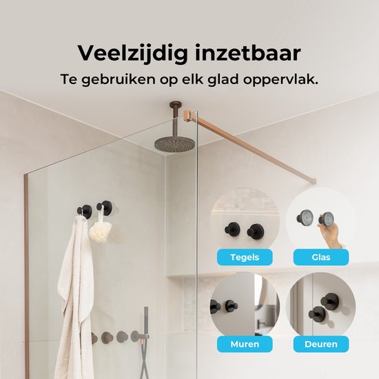 Donkere haken aan glazen douchewand, met handdoeken en een sponsje. Bevestigd op tegels, glas, muren en deuren.